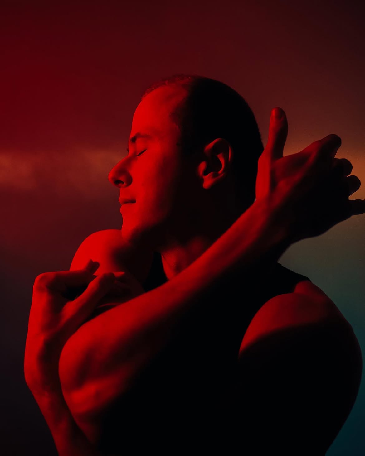 Creator photography lit with THE LIGHTER MAX 5000K with red gel filters