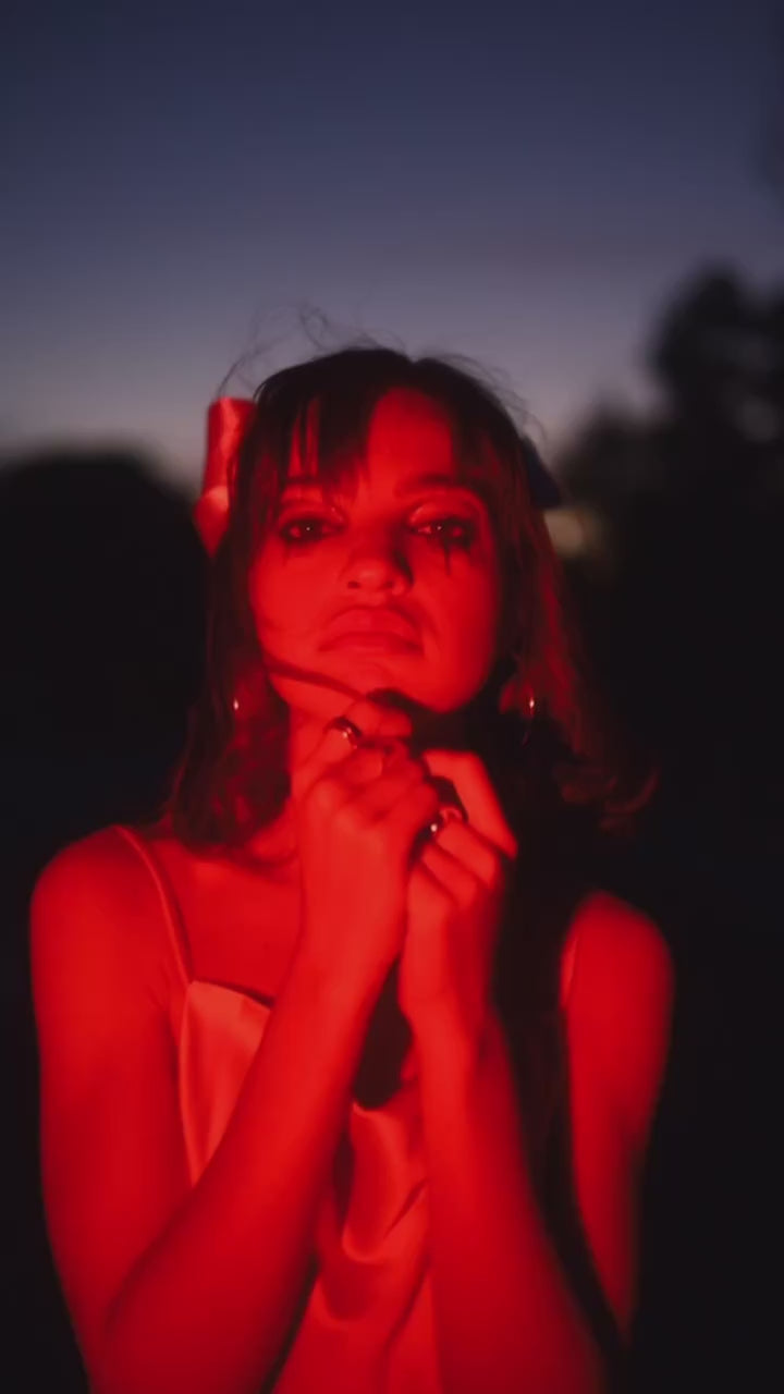 Creator video lit with THE LIGHTER MAX 3000K with red gel filters